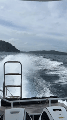 Boat cuts through choppy waters off Ao Nang coast