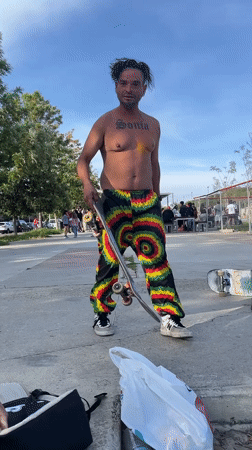 Skateboarder prepares trick attempt in Barcelona park