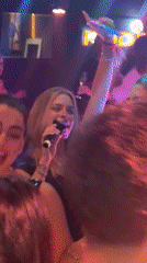 Night out at a colorful Cyprus club, dancing and lights