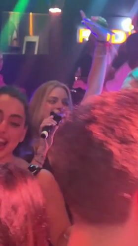 Night out at a colorful Cyprus club, dancing and lights