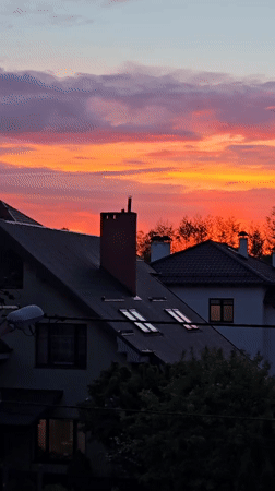 Colorful sunrise illuminates residential Kaliningrad neighborhood
