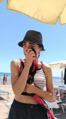 Costumed characters and sunbathers mix on a Peschici beach
