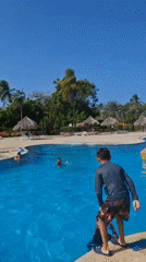 Beach resort pool activities captured at Playa El Agua