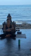 Beachfront yoga class held at thatched pavilion in Koh Samui