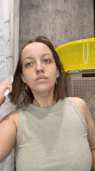 Morning skincare routine documented in Russian bathroom