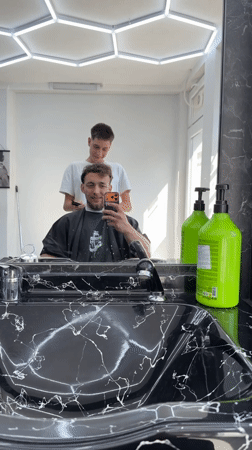 Customer documents barbershop visit with selfies in Tsarevo, Bulgaria