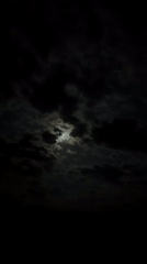 Moon illuminates passing clouds in Bulgaria night sky