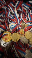 Collection of medals with patriotic ribbons displayed in Saint Petersburg