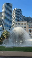 Tourist Documents Brief Monaco Visit With Flora and Fountain Photos