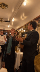 Musical duo performs in elegant French dining car