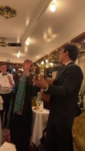 Musical duo performs in elegant French dining car