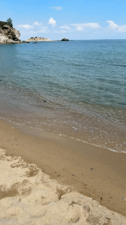 Beach resort documentation captured in Kavala, Greece during sunny afternoon