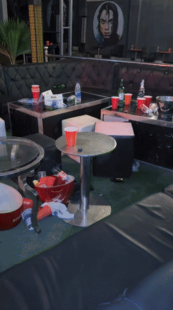 Post-party cleanup documented at Guzape bar establishment