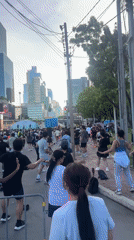 Bangkok residents enjoy morning exercise and recreation in city parks