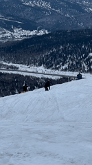 Morning ski resort activity captured across terrain parks and slopes