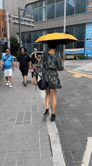 Summer morning at Haeundae Beach, Busan — beach life and street scenes