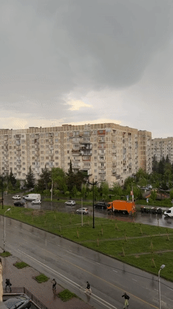 Rainy afternoon documented across Tbilisi neighborhoods during May storm
