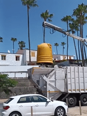 Garbage truck collects waste in San Bartolomé de Tirajana