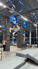 Man navigates indoor obstacle course in Kazan gym