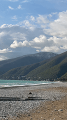 Visitor documents coastal scenes and architecture in Gagra, Abkhazia