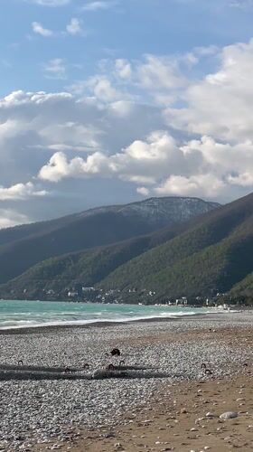 Visitor documents coastal scenes and architecture in Gagra, Abkhazia