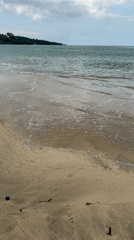 Early morning beach walk captured in Kuta Selatan