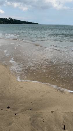 Early morning beach walk captured in Kuta Selatan