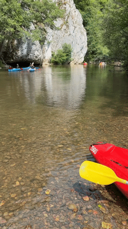 Kayakers paddle river in Hulsonniaux, Belgium Saturday morning