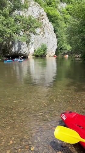 Kayakers paddle river in Hulsonniaux, Belgium Saturday morning