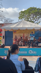 Community celebration with youth performance in Juan Griego, Venezuela