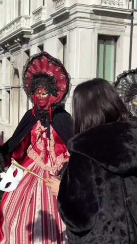 Venice Carnival celebrations draw costumed revelers to historic canals