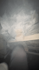 Rescue workers search through collapsed structure debris in Gaza