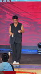 Street performer stages juggling and acrobatic show for children
