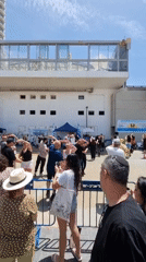 Circle dance filmed by onlookers in Tel Aviv square