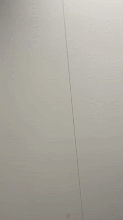 Woman filmed in London changing room corridor facility