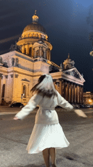 Evening gatherings documented around illuminated Saint Isaac's Cathedral, Saint Petersburg