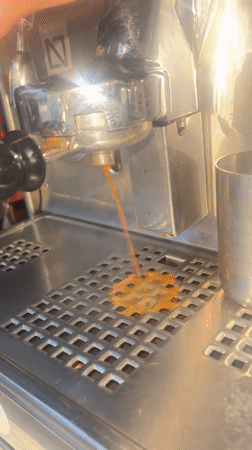 Mobile coffee vendor serves espresso in Martil, Morocco