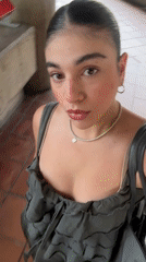 Woman records selfies in San Bernardino Tlaxcalancingo, Mexico