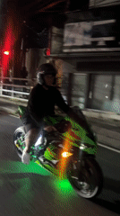 Green motorcycle with underglow lighting spotted in Kuta