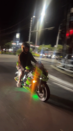 Green motorcycle with underglow lighting spotted in Kuta