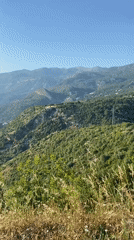 Tourist captures selfie amid scenic Montenegro coastal views