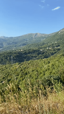 Tourist captures selfie amid scenic Montenegro coastal views