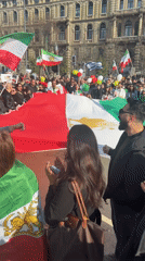 Multi-national flag demonstration held at Milan's Castello Sforzesco