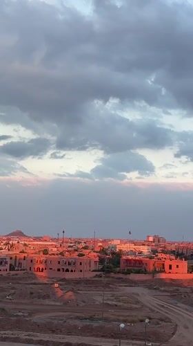 Sunset panorama captured over Marrakesh's red cityscape