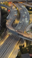 Evening traffic flows through Kuala Lumpur highway interchange