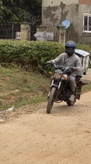 Everyday street life documented across Abuja neighborhoods