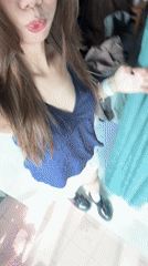 Woman records selfie video indoors in Nan'an District