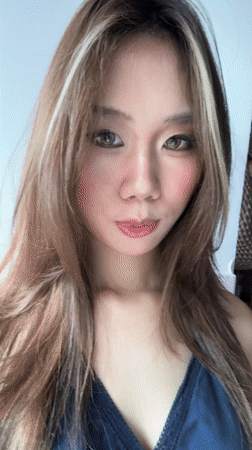 Woman records selfie video indoors in Nan'an District