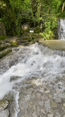 Tourist visits Russian Orthodox monastery, documents waterfalls and gardens