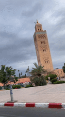 Ornate minaret tower documented in Marrakesh park setting